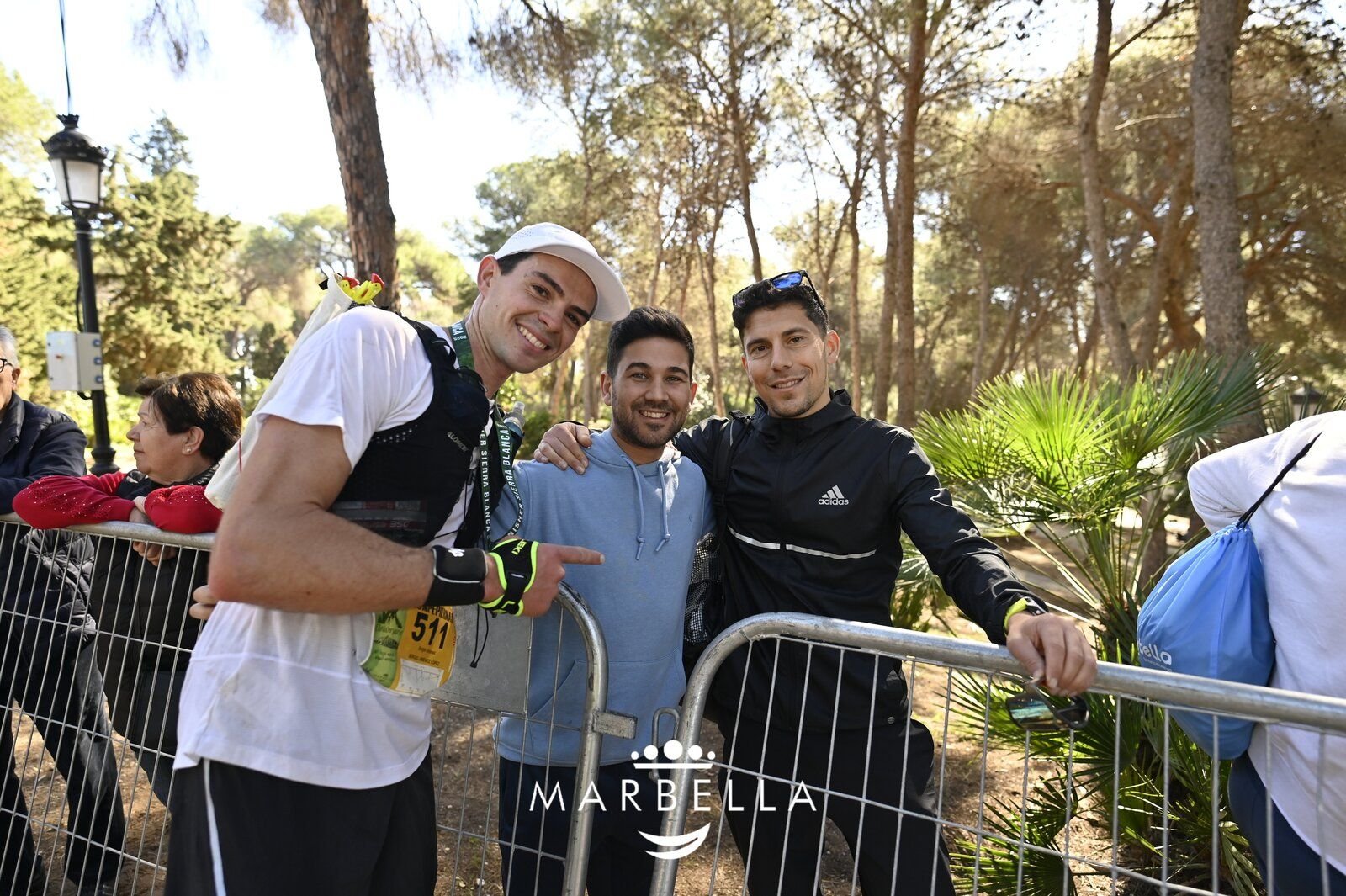 A companion cheering on a runner during Marbella Epic Trail